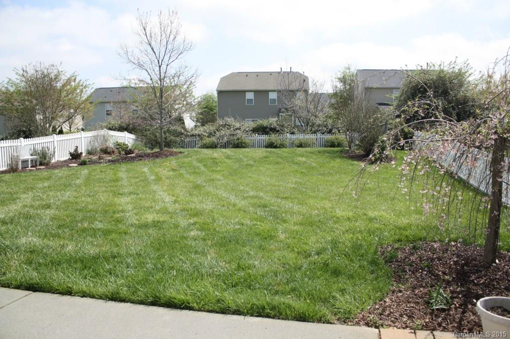 6418 Hermsley Road Charlotte, NC 28278 - Photo 18 of 22 a view of a large garden with plants and large trees