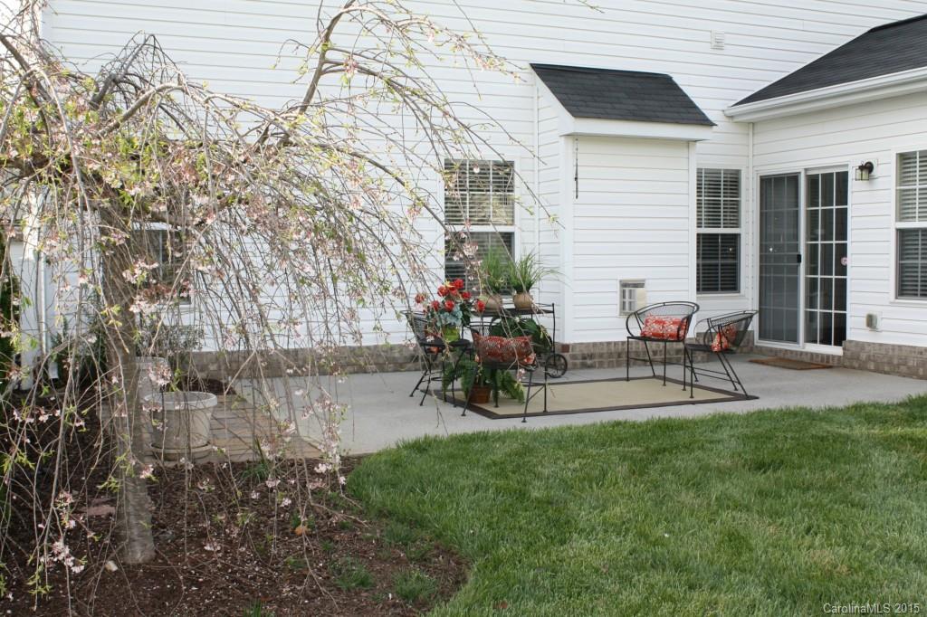 6418 Hermsley Road Charlotte, NC 28278 - Photo 19 of 22 a view of house with backyard and sitting area
