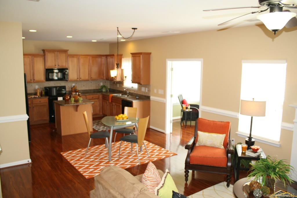 6418 Hermsley Road Charlotte, NC 28278 - Photo 5 of 22 a living room with furniture kitchen and a table
