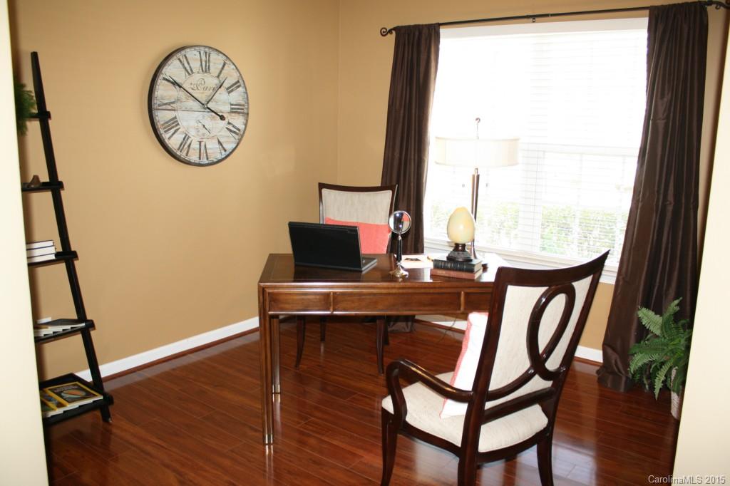 6418 Hermsley Road Charlotte, NC 28278 - Photo 9 of 22 a view of a room with furniture window and wooden floor