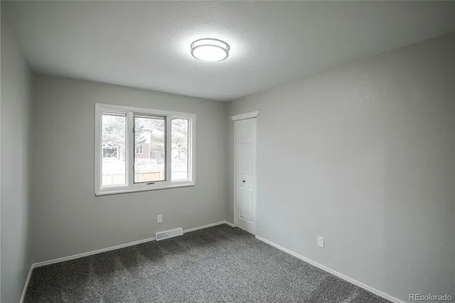 an empty room with a window