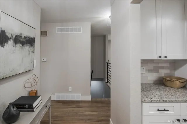 a view of a storage and utility room with closet