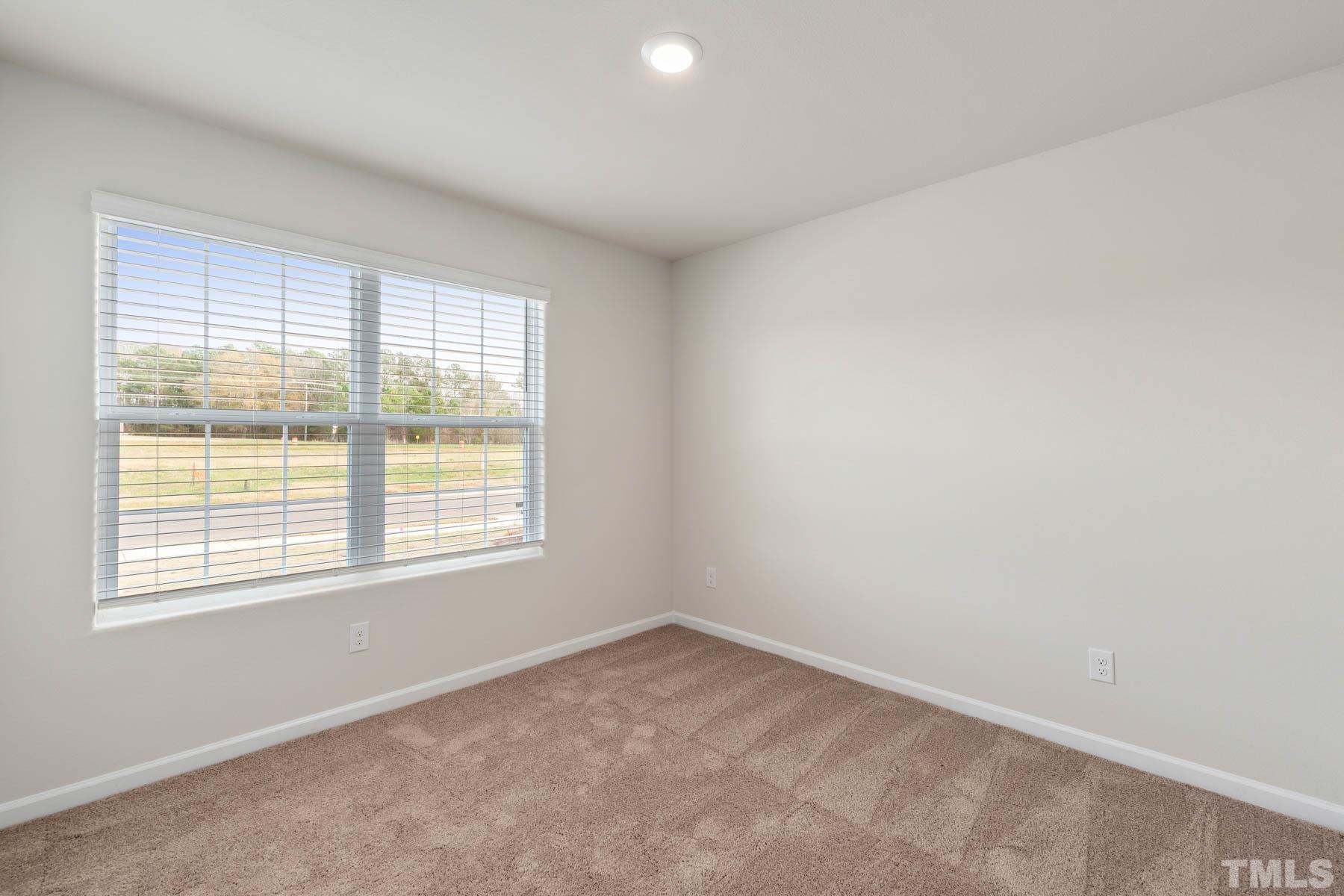540 Crow Field Street Roxboro, NC 27574 - Photo 16 of 17 an empty room with a window