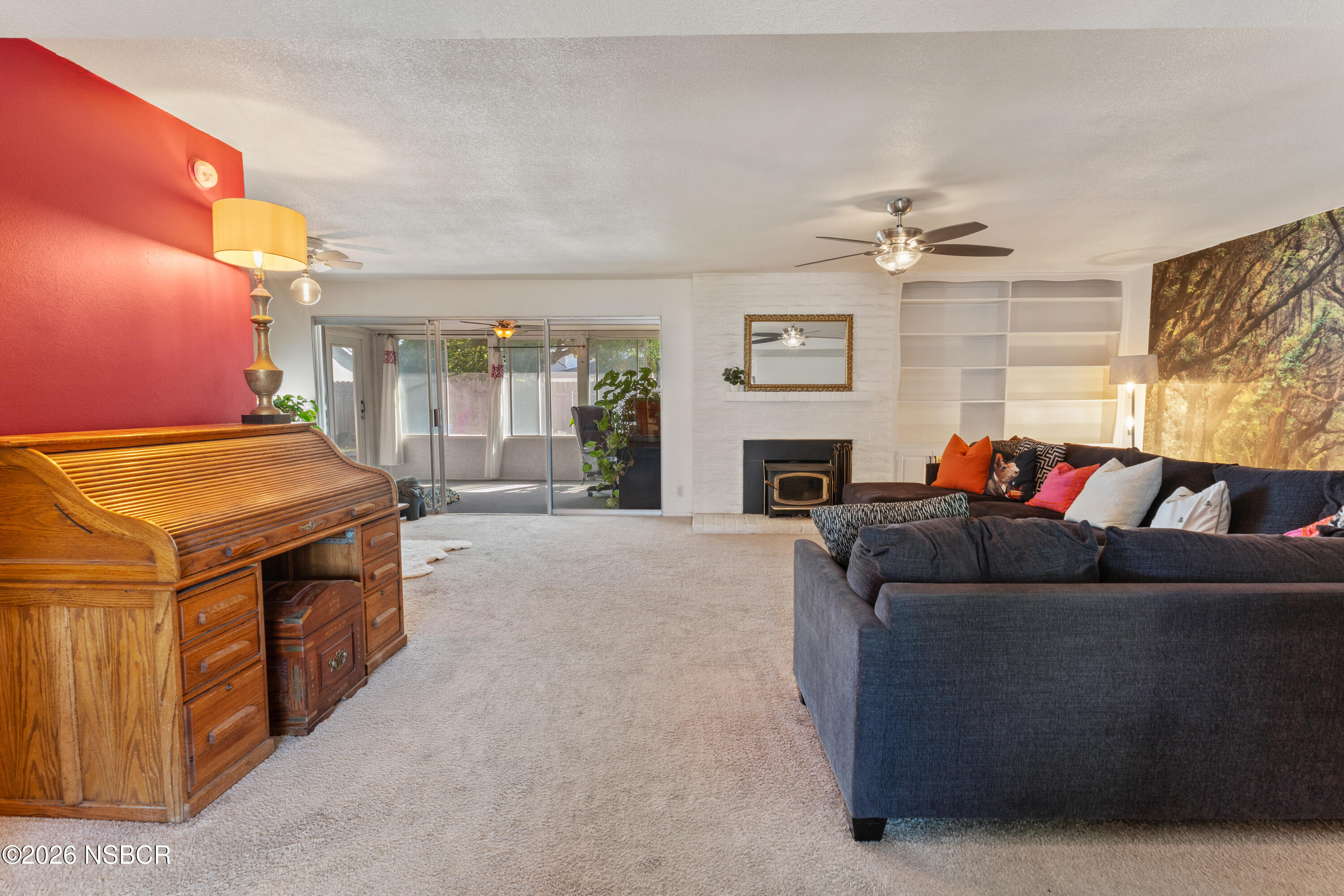 4220 Constellation Road Lompoc, CA 93436 - Photo 4 of 22 a living room with furniture and a fireplace