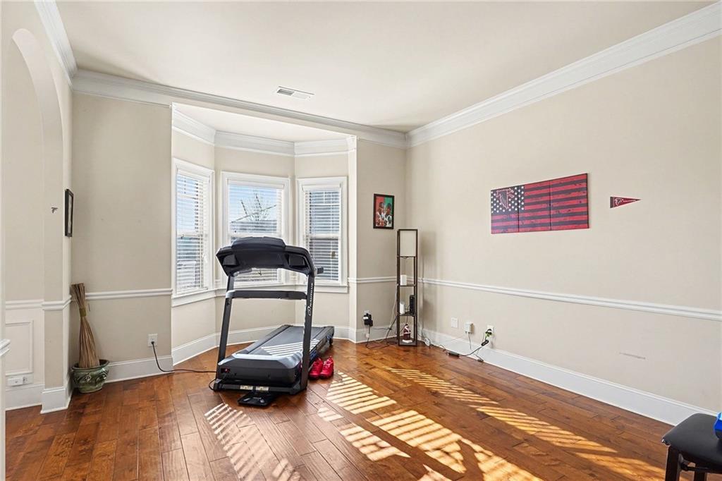 560 Aerial Avenue Stockbridge, GA 30281 - Photo 11 of 35 a room with a bed and a window