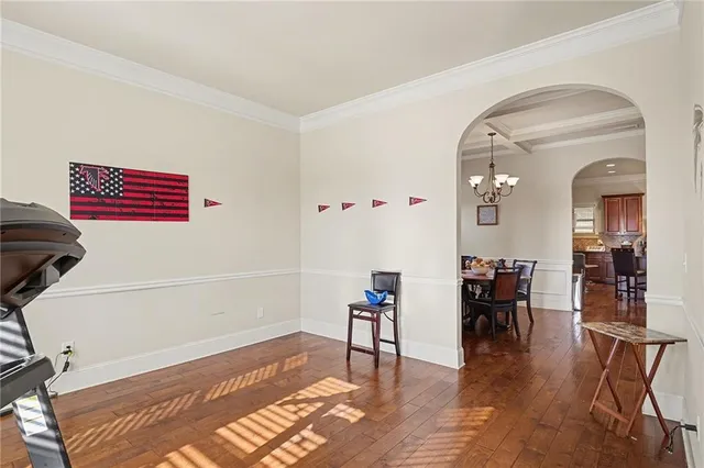 a view of a livingroom with furniture and wooden floor