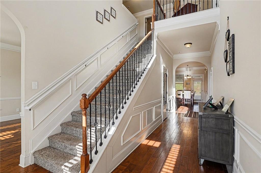 560 Aerial Avenue Stockbridge, GA 30281 - Photo 13 of 35 a view of entryway and hall with wooden floor