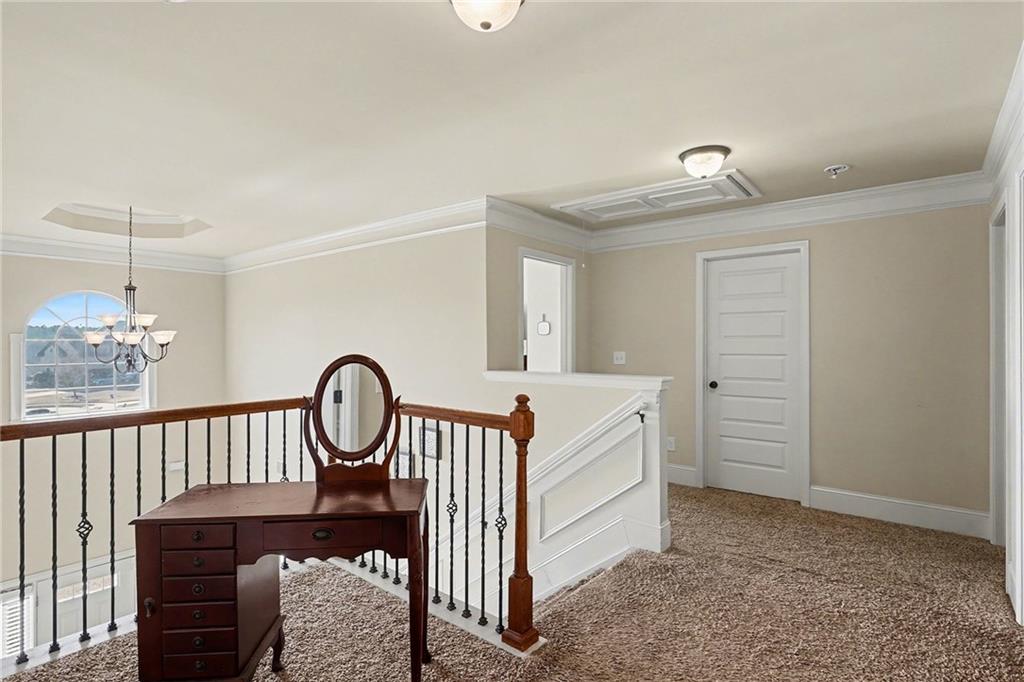 560 Aerial Avenue Stockbridge, GA 30281 - Photo 14 of 35 a view of a hallway view with staircase
