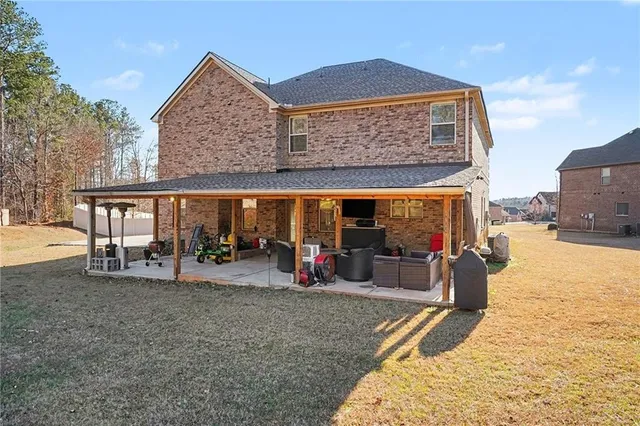a view of a house with patio