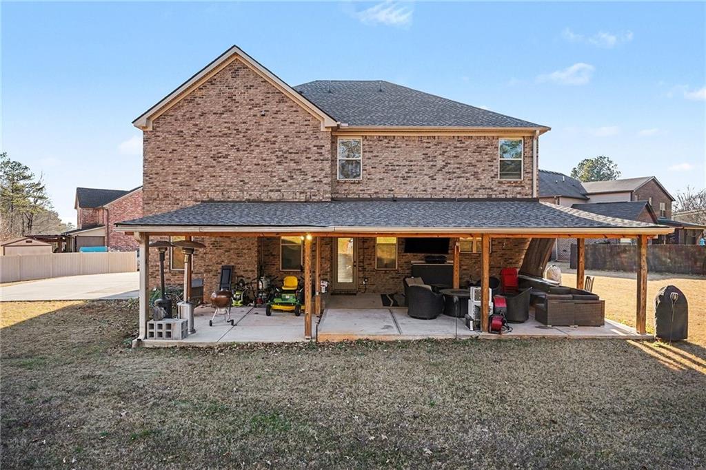 560 Aerial Avenue Stockbridge, GA 30281 - Photo 34 of 35 a view of a chairs and tables in patio