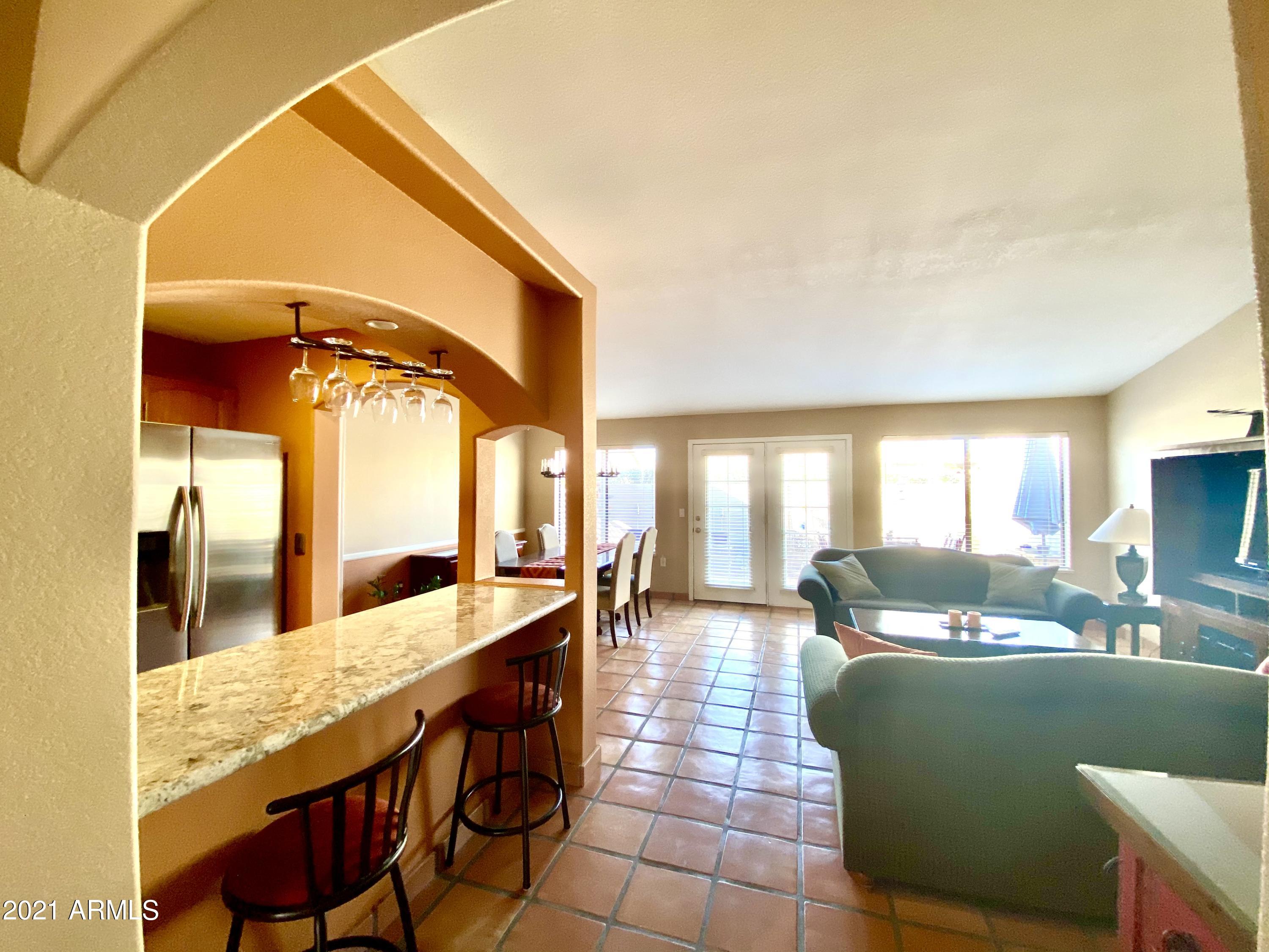 2329 North Recker Road, Unit 90 Mesa, AZ 85215 - Photo 5 of 22 Saltillo tile throughout home