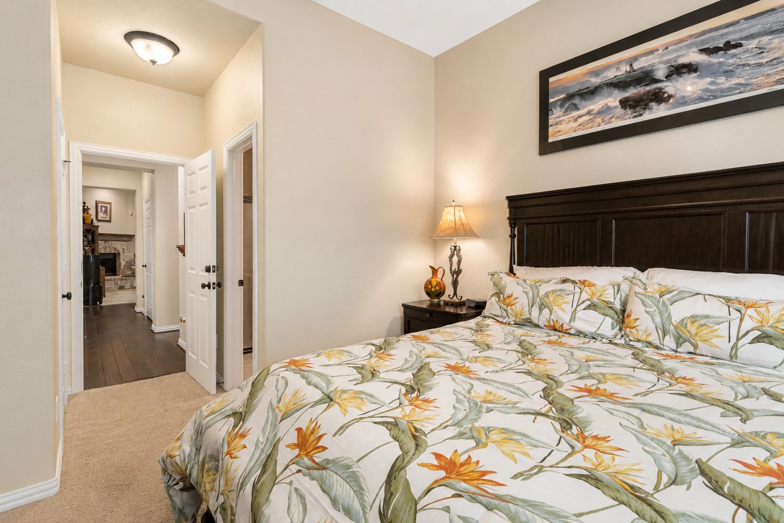2326 Hamilton Pool Lane Friendswood, TX 77546 - Photo 27 of 49 a bedroom with a bed and a lamp