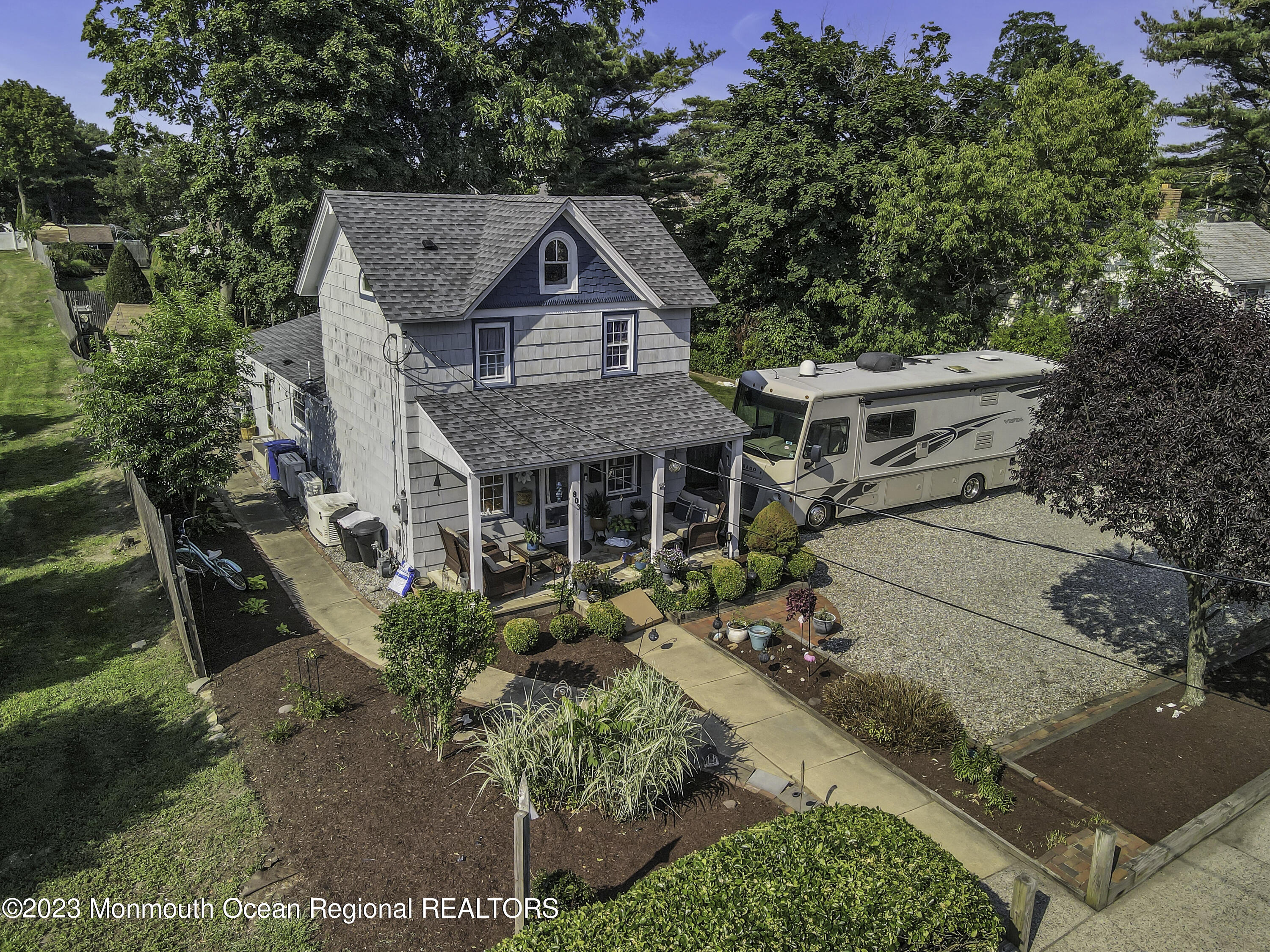 803 Ocean Road Point Pleasant, NJ 08742 - Photo 28 of 43 an aerial view of a house with a yard