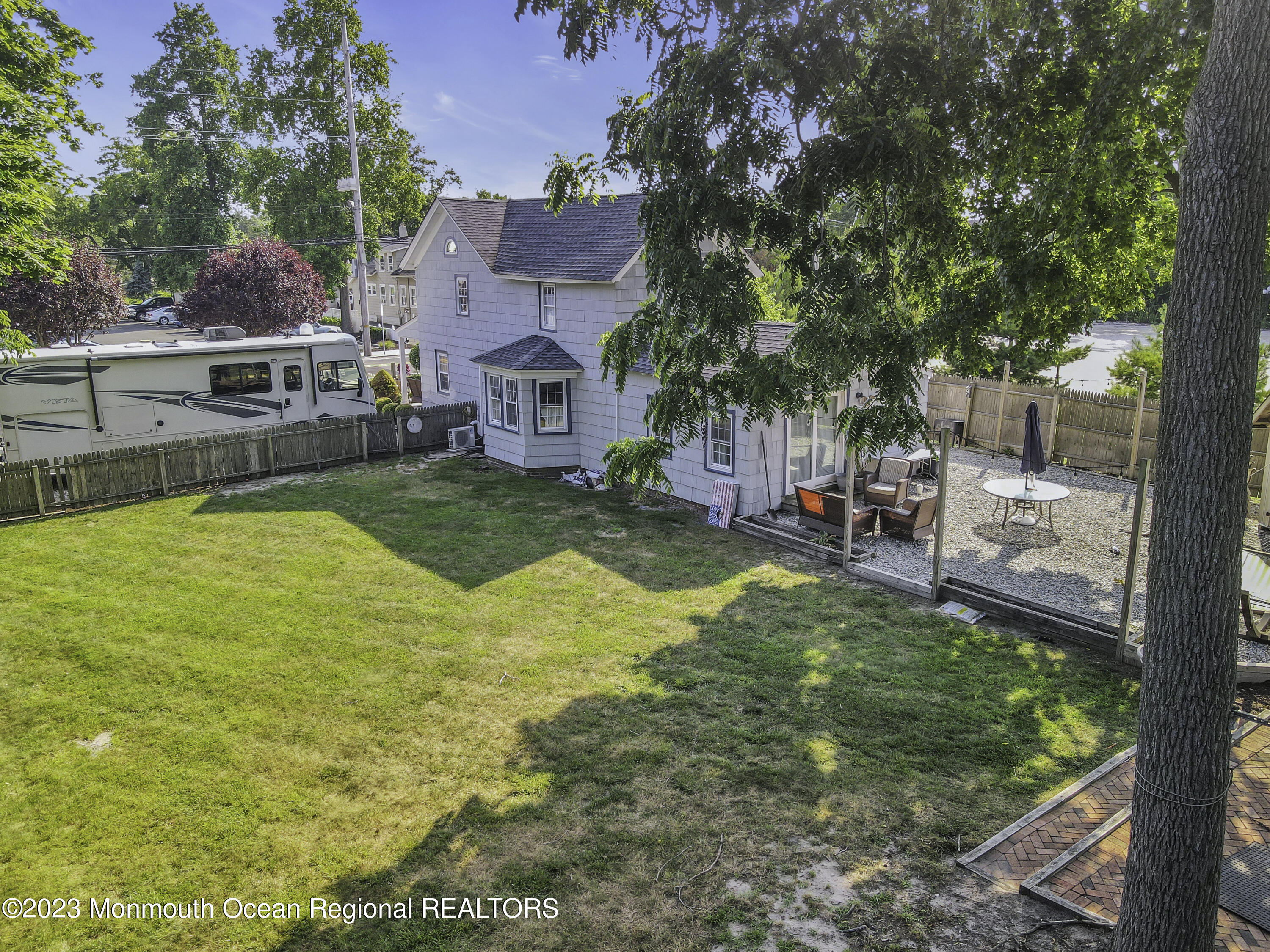 803 Ocean Road Point Pleasant, NJ 08742 - Photo 30 of 43 a view of a swimming pool with a patio