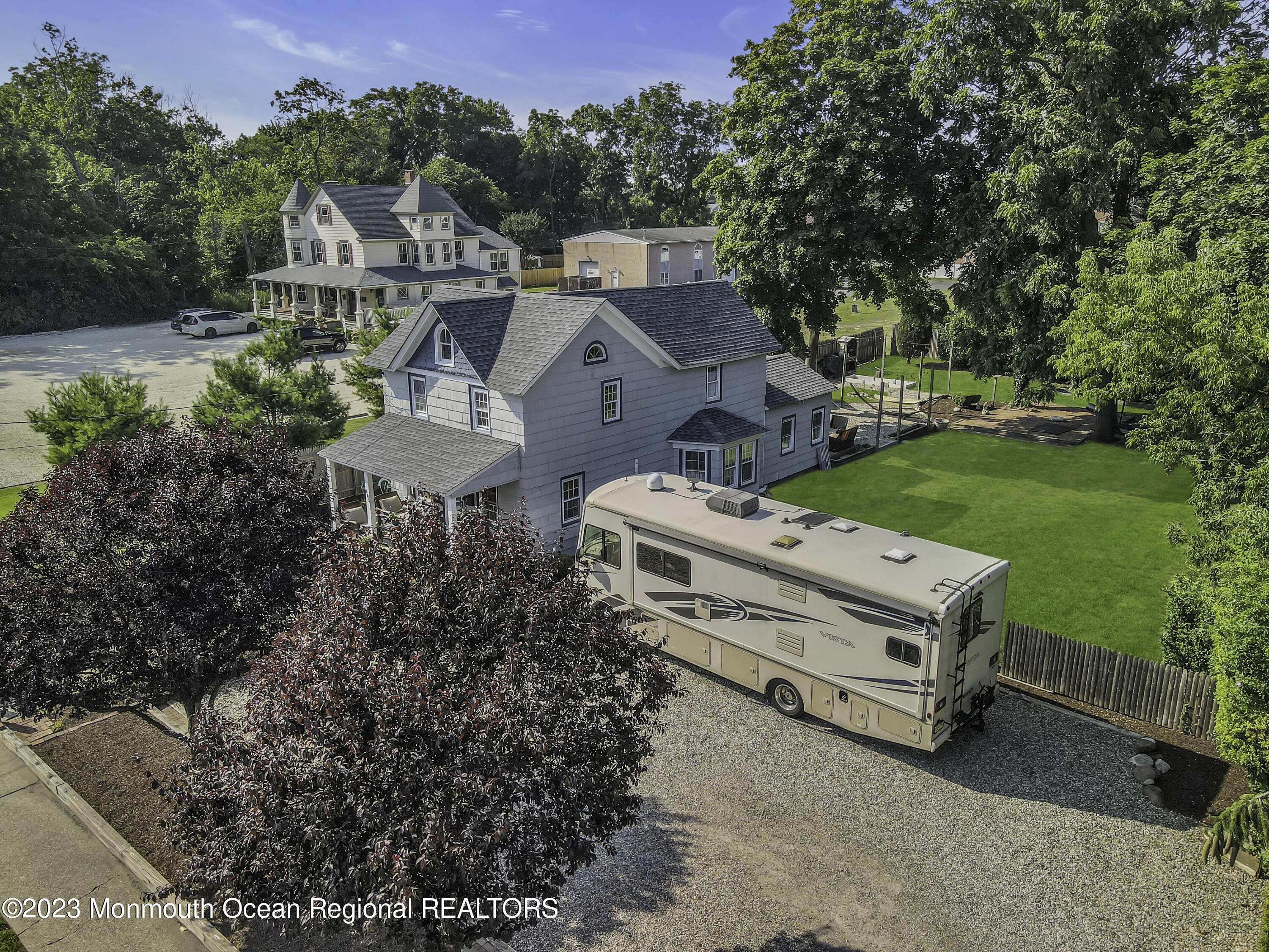 803 Ocean Road Point Pleasant, NJ 08742 - Photo 3 of 43 a view of a house with a yard and sitting area