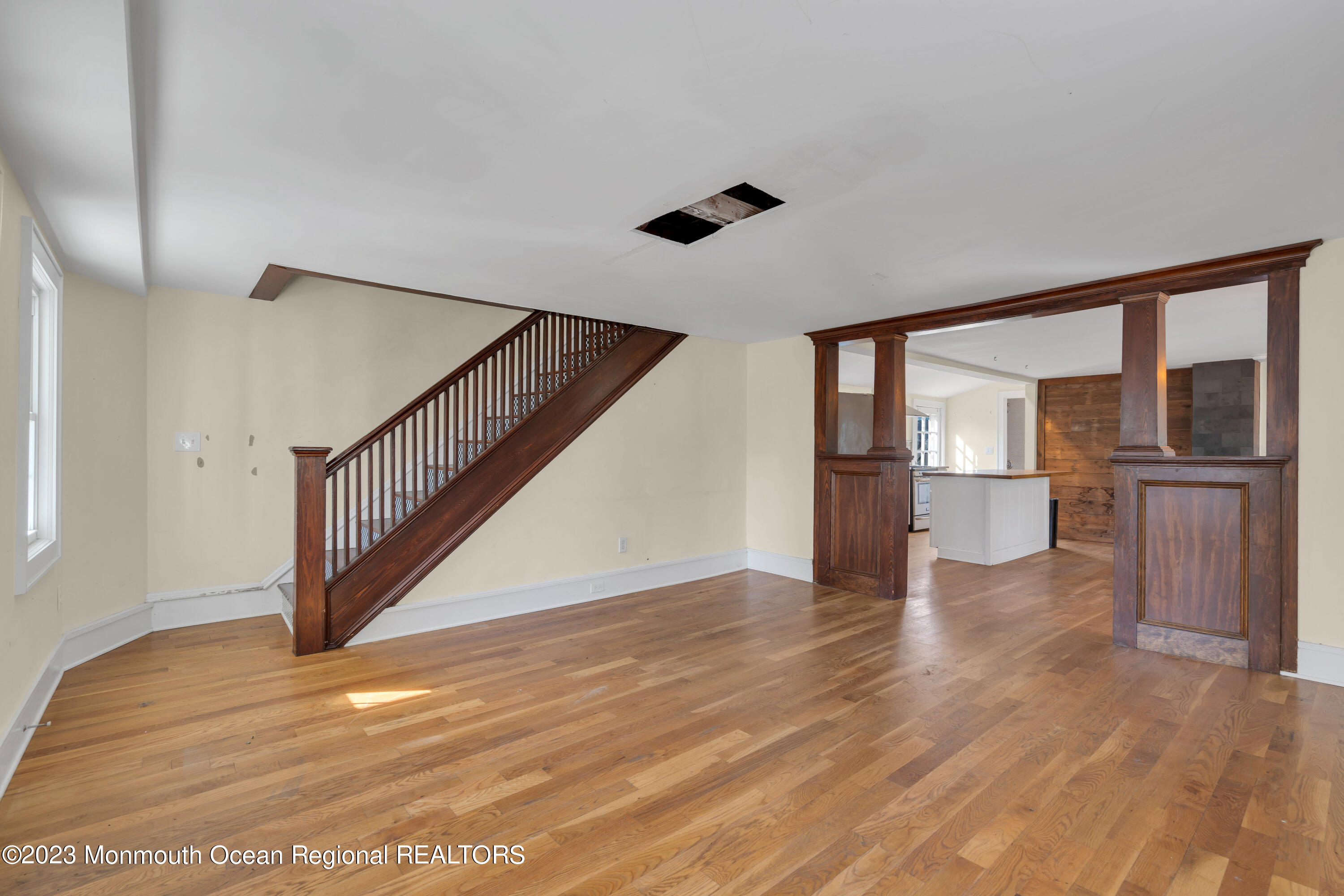 803 Ocean Road Point Pleasant, NJ 08742 - Photo 8 of 43 a view of entryway and hall with wooden floor