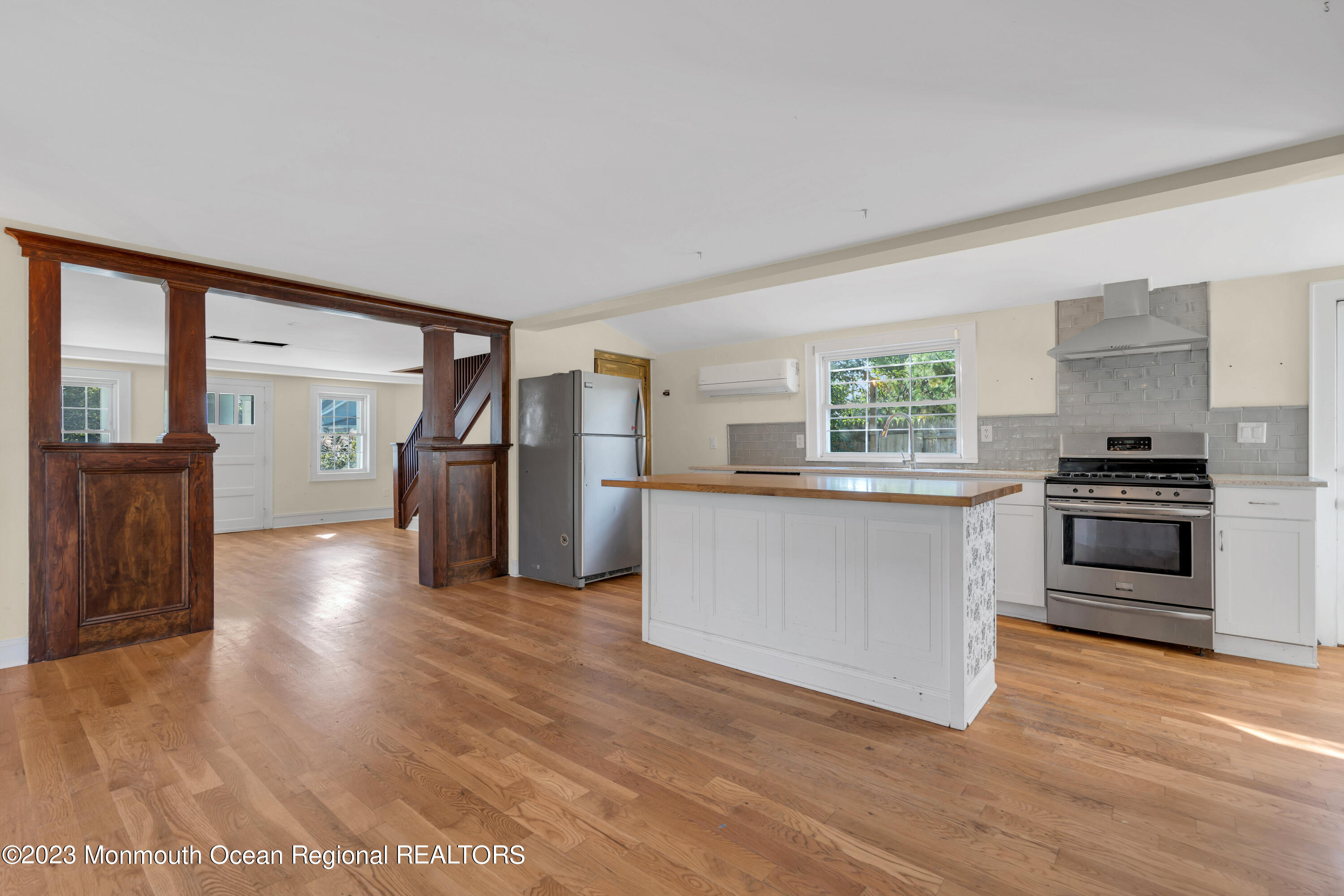 803 Ocean Road Point Pleasant, NJ 08742 - Photo 10 of 43 a kitchen with stainless steel appliances a refrigerator and a stove top oven
