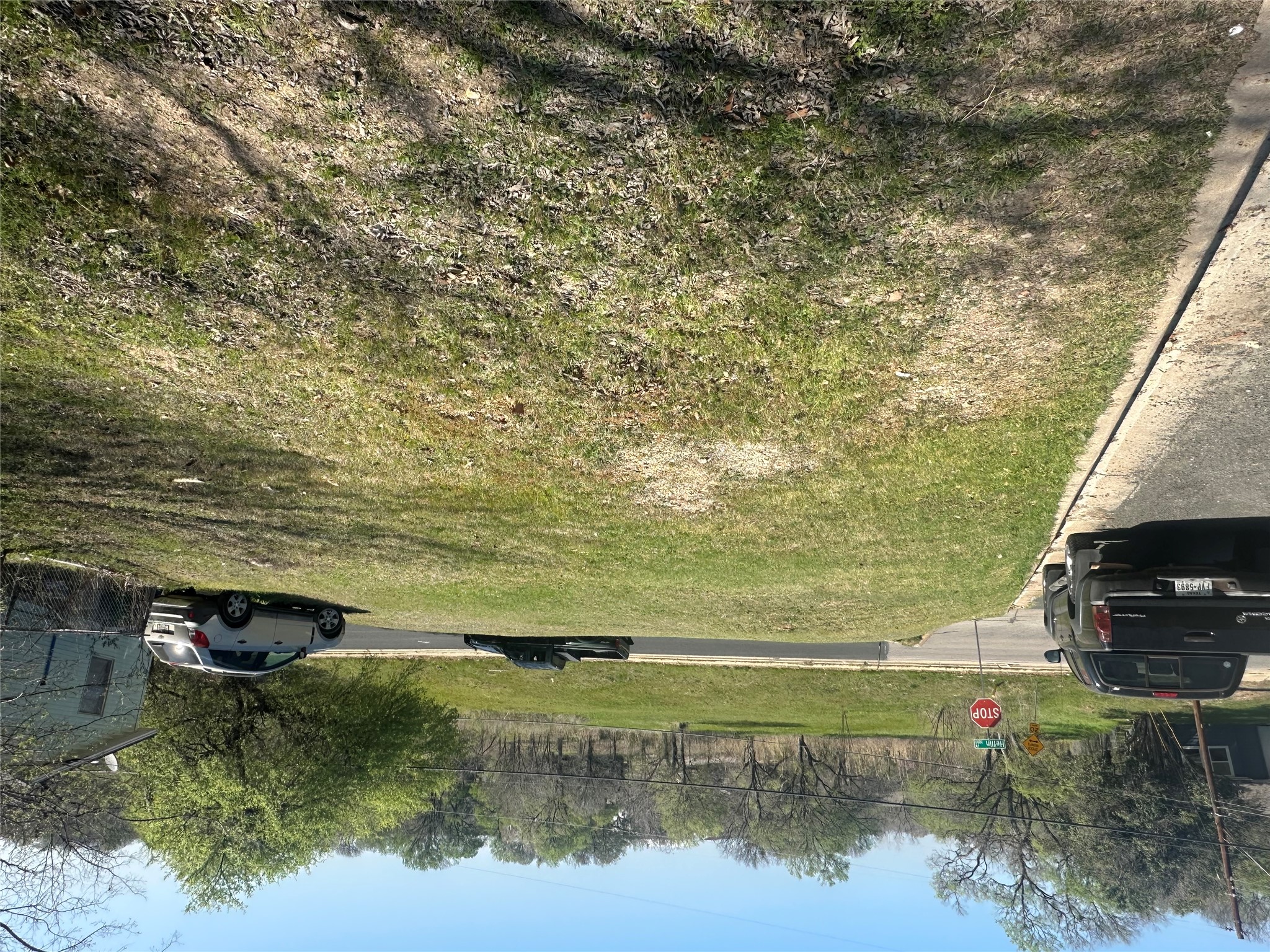 5003 Heflin Lane Austin, TX 78721 - Photo 5 of 9 a view of a street with a car parked in the background