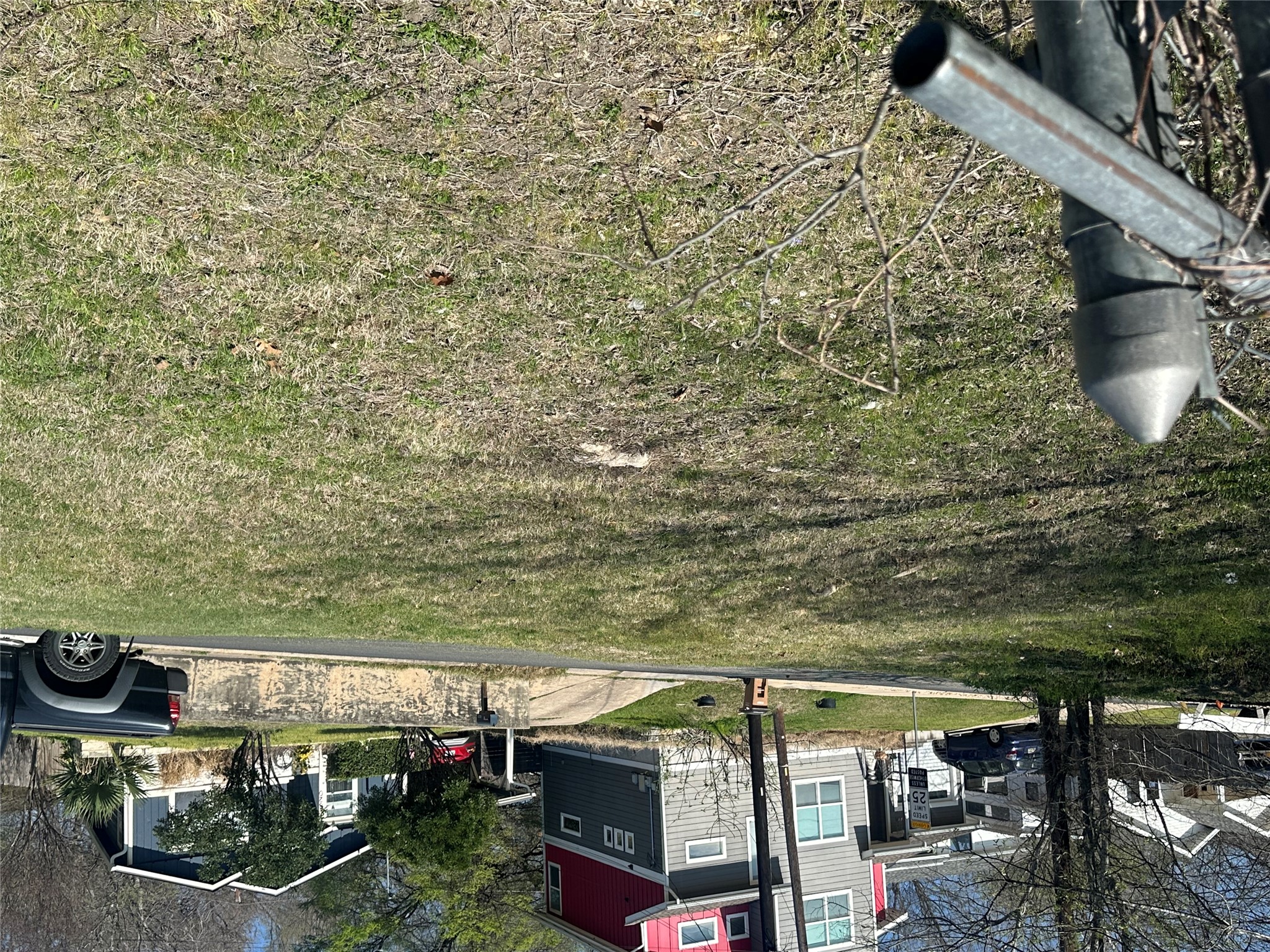 5003 Heflin Lane Austin, TX 78721 - Photo 7 of 9 a view of a yard with yellow house