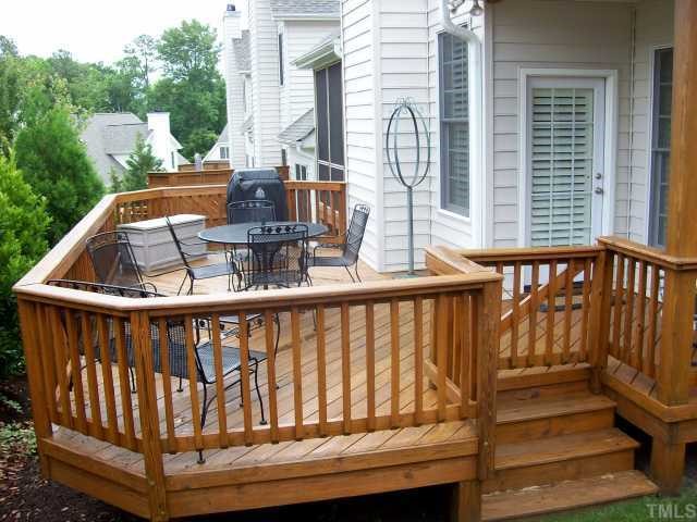 7335 Fontana Ridge Lane Raleigh, NC 27613 - Photo 2 of 12 a view of a balcony with two chairs