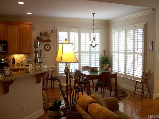 7335 Fontana Ridge Lane Raleigh, NC 27613 - Photo 6 of 12 a view of a dining room with furniture window and outside view
