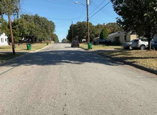 a view of a yard with of trees