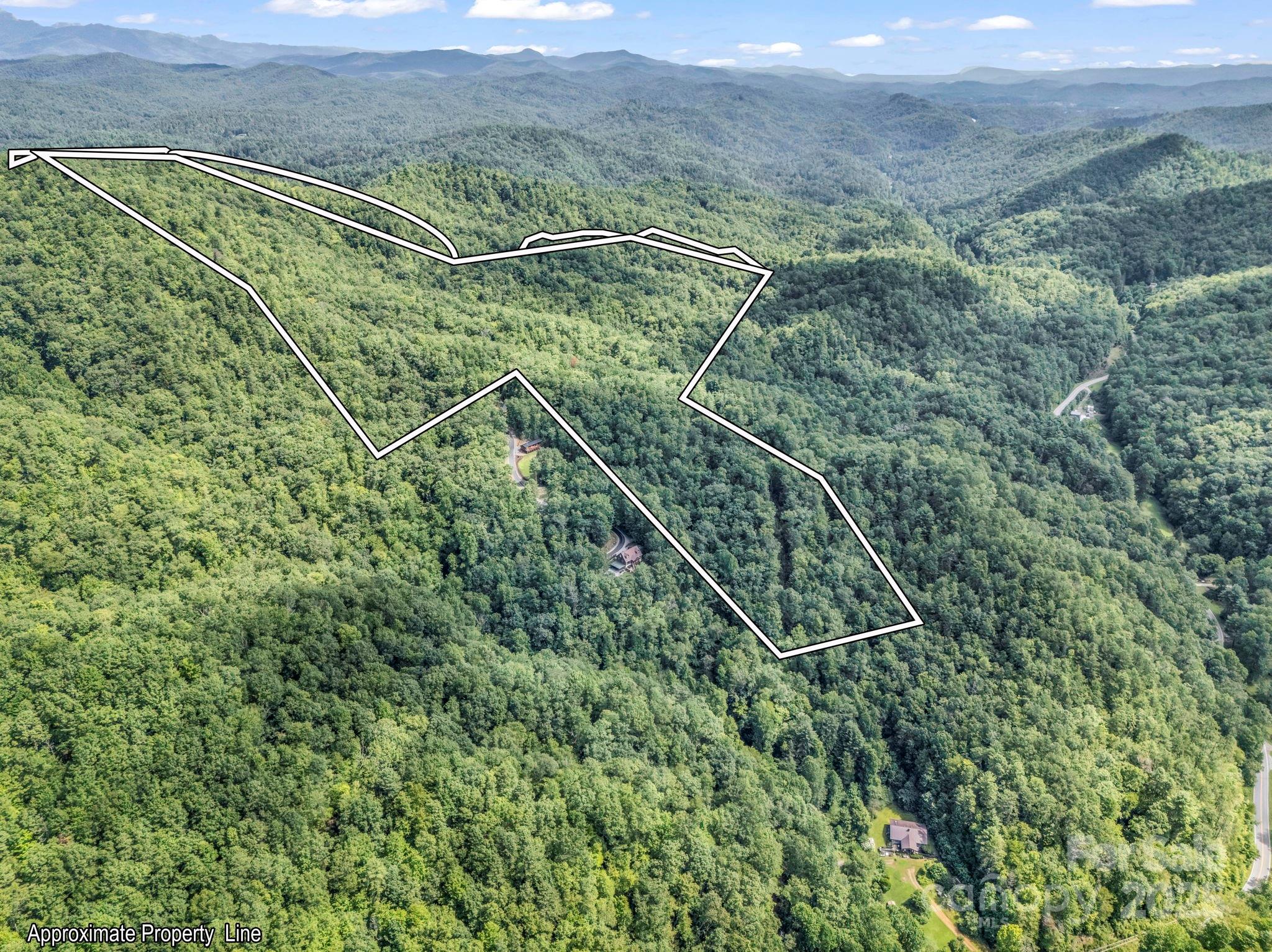 Tbd Frozen Creek Road Brevard, NC 28712 - Photo 10 of 30 an aerial view of a house with a yard