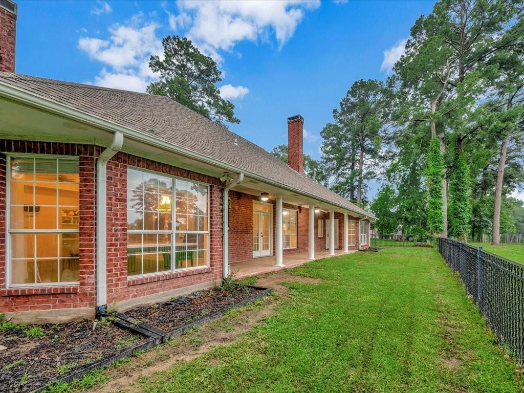 206 Cascade Court Lufkin, TX 75901 - Photo 23 of 29 a view of a house with a yard