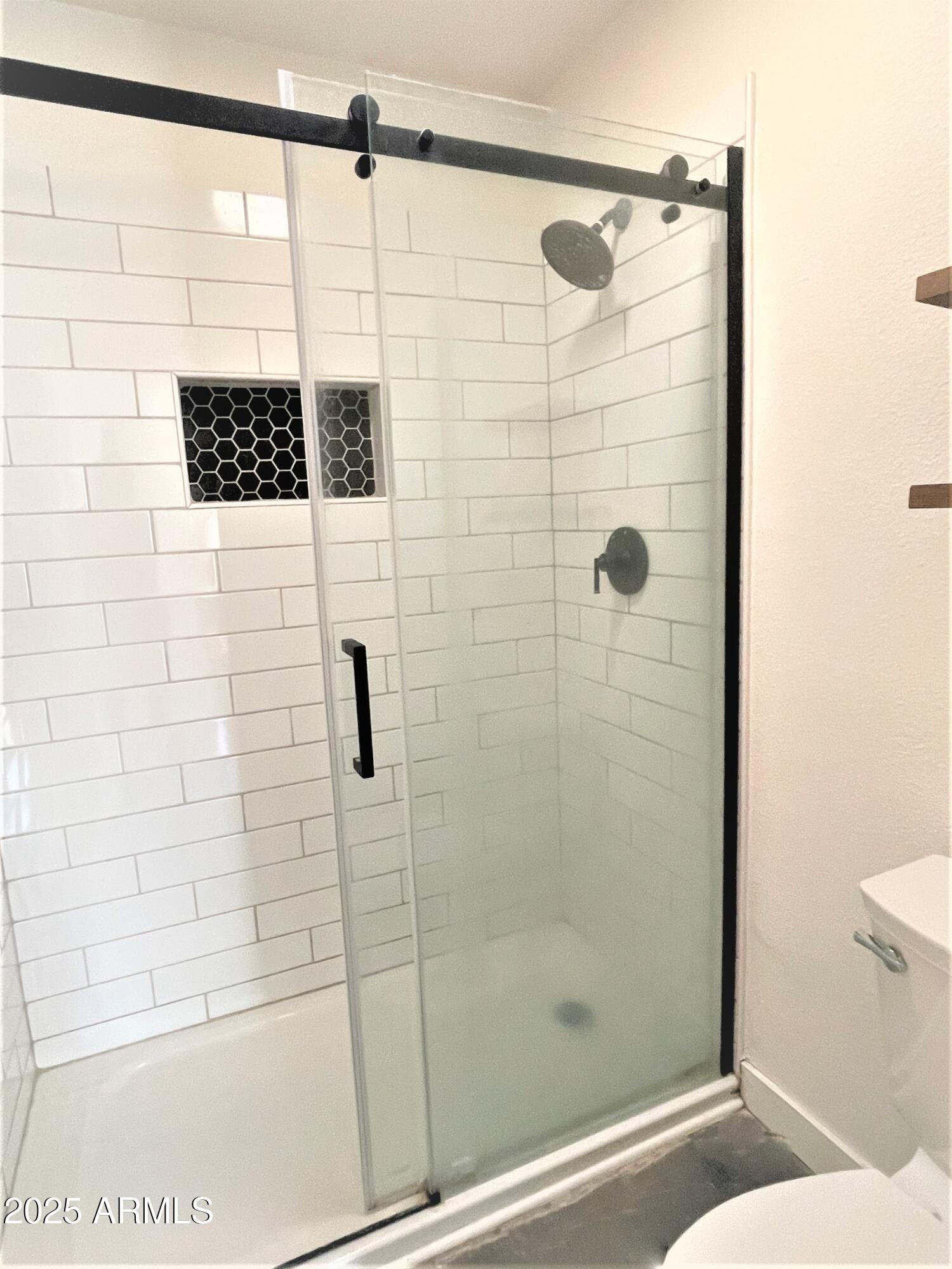 8 West Griswold Road Phoenix, AZ 85021 - Photo 13 of 22 a bathroom with a shower and a toilet