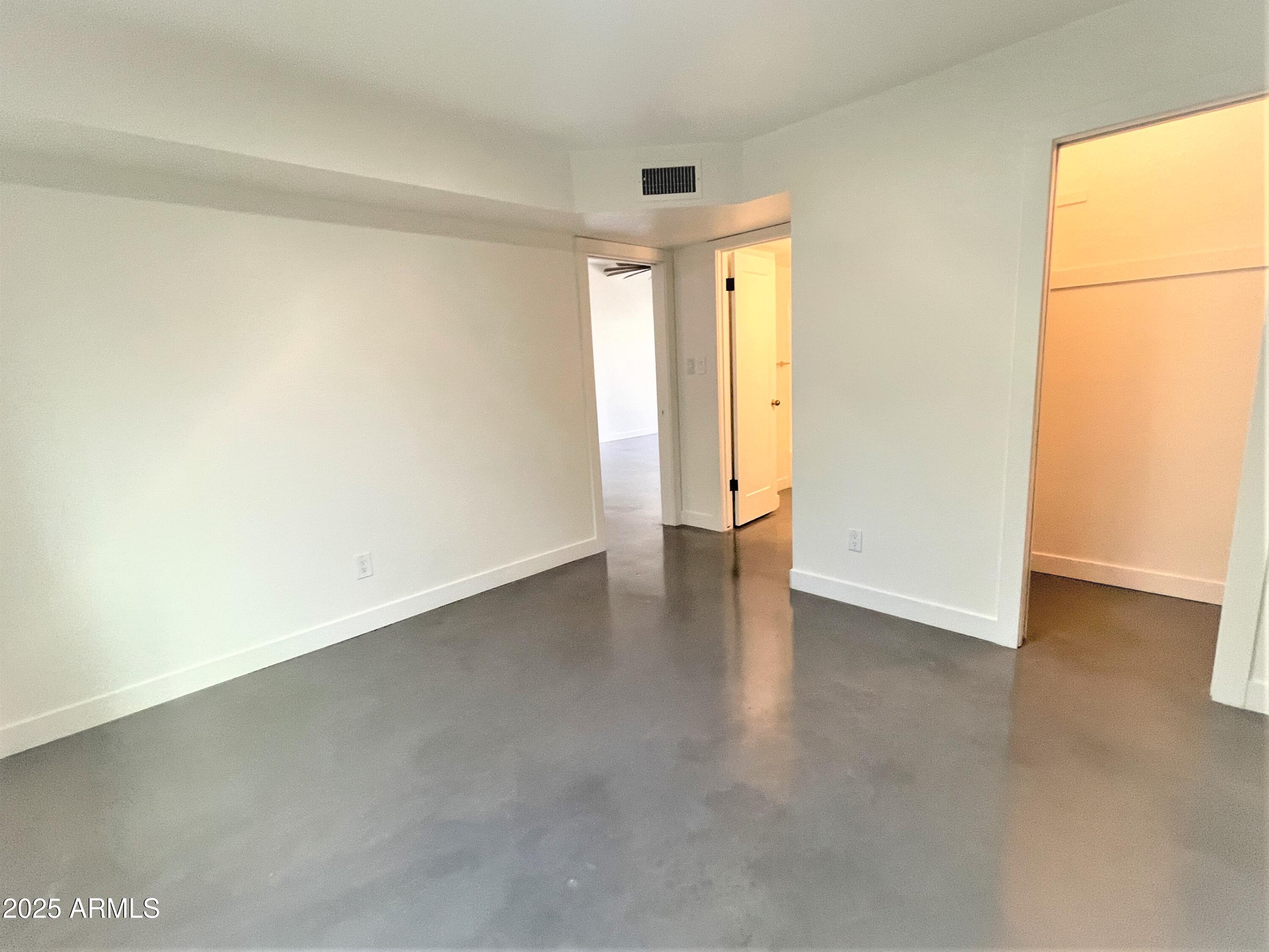 8 West Griswold Road Phoenix, AZ 85021 - Photo 16 of 22 a view of an empty room and window