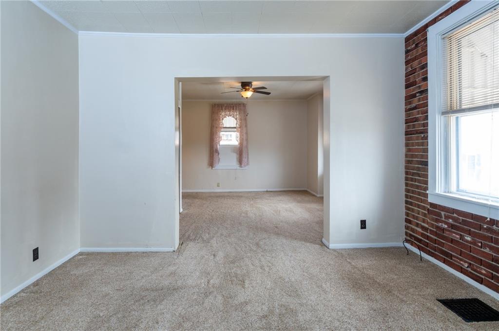 451 Ohio Avenue Rochester, PA 15074 - Photo 4 of 17 an empty room that has a window
