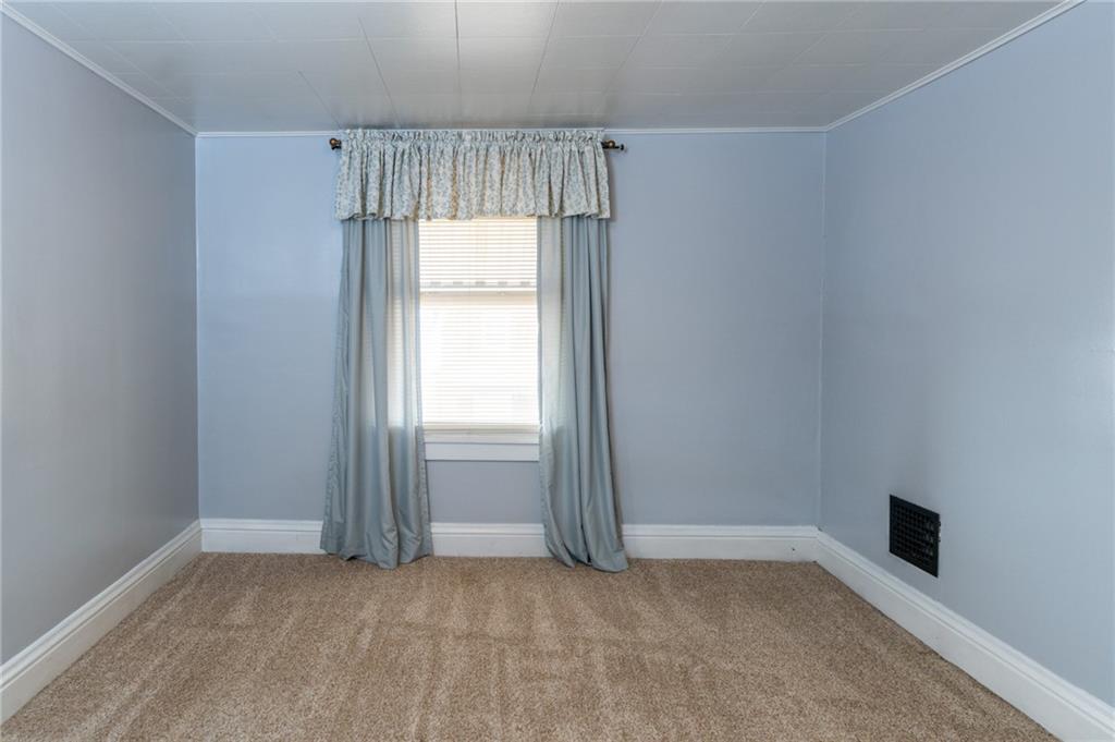 451 Ohio Avenue Rochester, PA 15074 - Photo 5 of 17 an empty room with windows