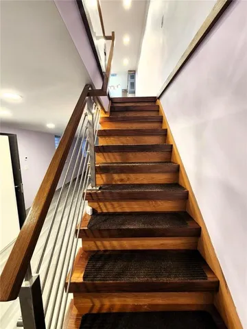 a view of entryway with wooden floor
