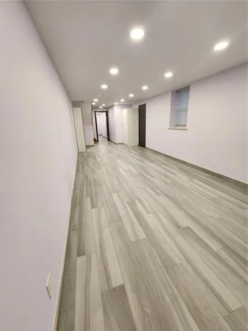 a view of a living room and kitchen