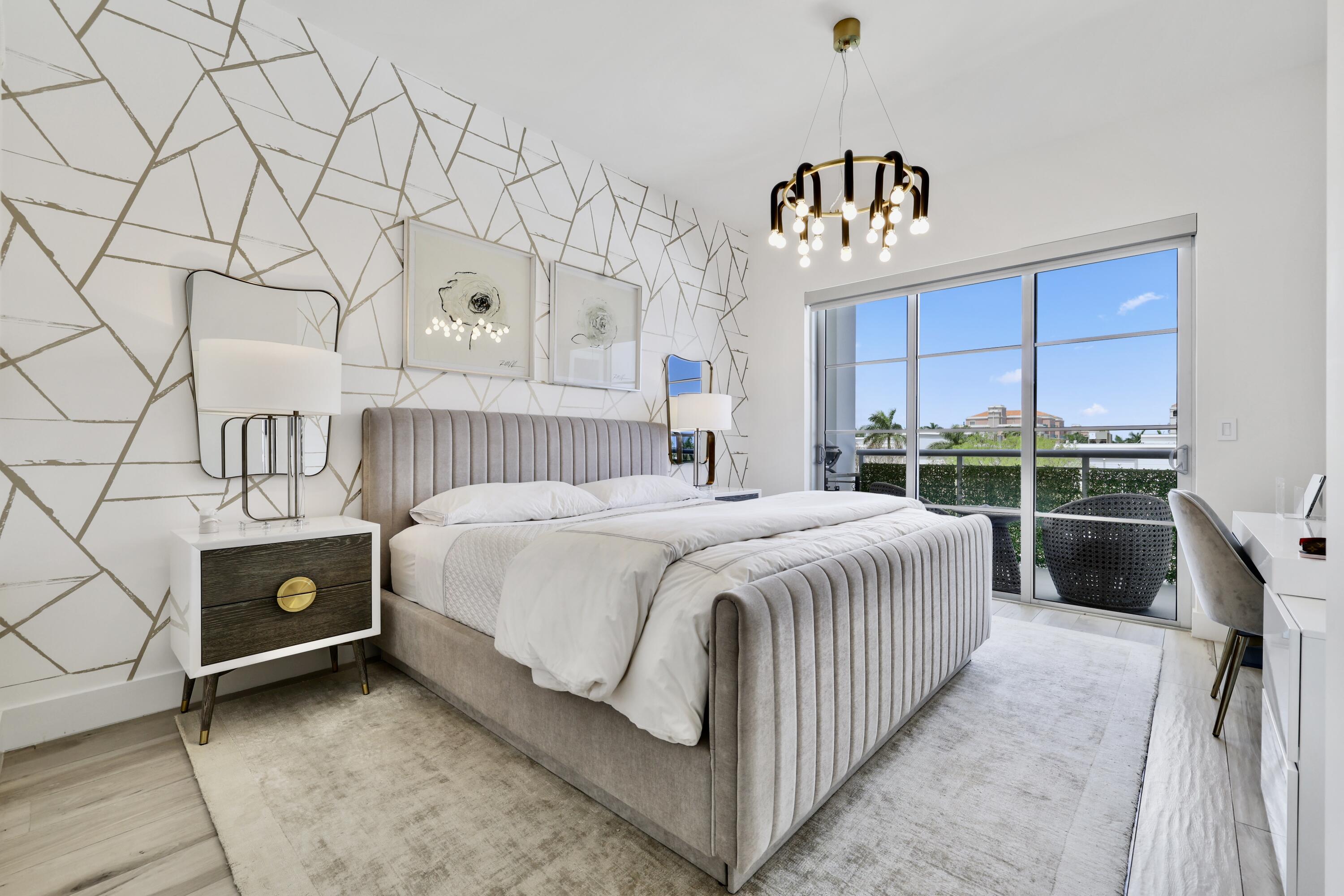 155 East Boca Raton Road, Unit 413 Boca Raton, FL 33432 - Photo 11 of 28 a bedroom with a bed and a window