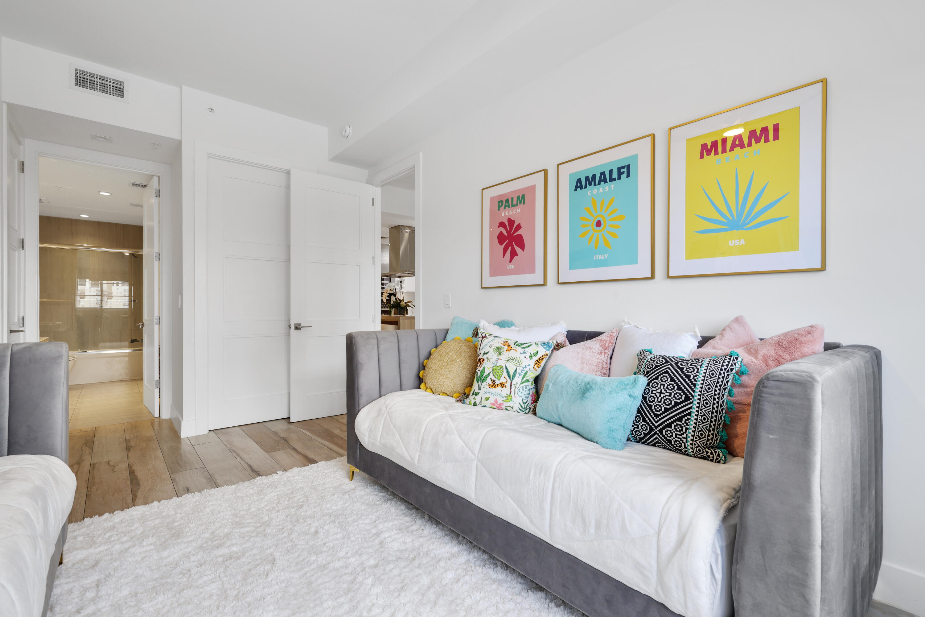 155 East Boca Raton Road, Unit 413 Boca Raton, FL 33432 - Photo 17 of 28 a living room with furniture and painting on the wall