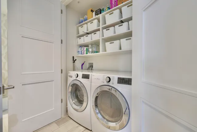 a utility room with dryer and washer