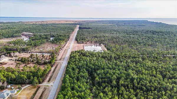 a view of a yard with an outdoor seating
