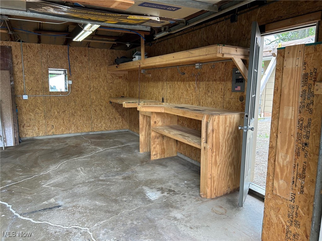6261 Springwood Road Cleveland, OH 44130 - Photo 24 of 27 Shelves galore in the garage