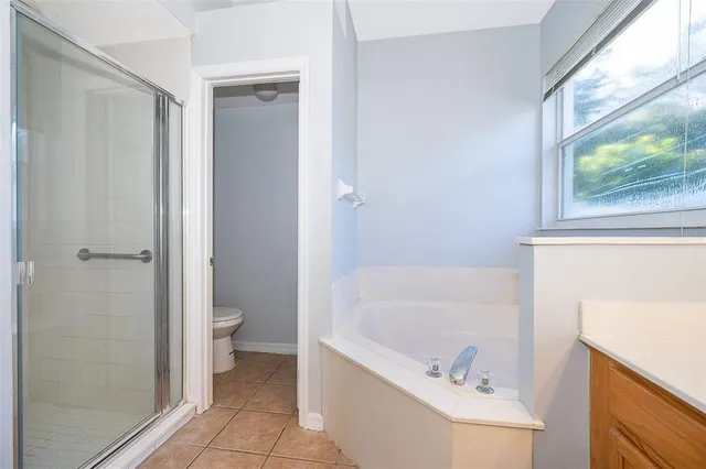 a bathroom with a bathtub and a sink