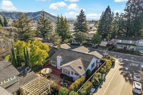 an aerial view of a house with outdoor space