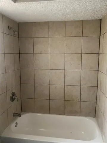 a view of a room that has a large window