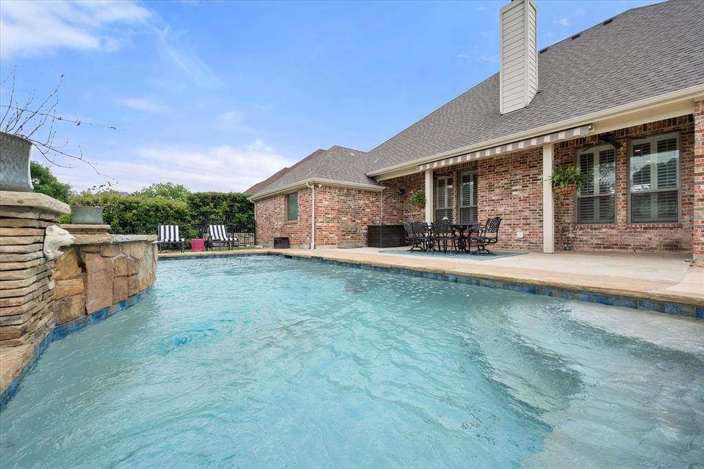 7641 Eagle Ridge Circle Fort Worth, TX 76179 - Photo 1 of 1 a view of a house with a yard