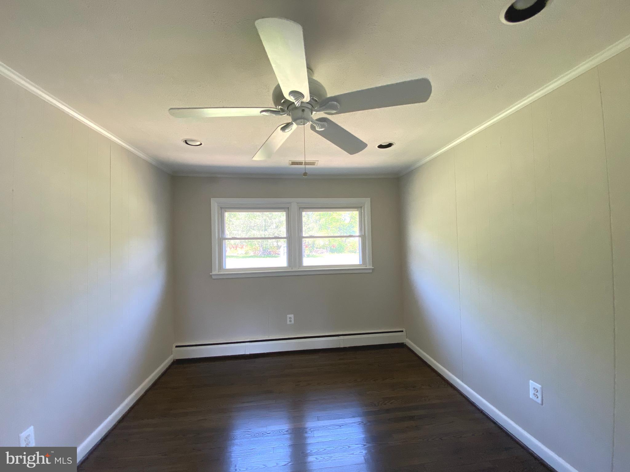 5072 Rock Springs Road Warrenton, VA 20187 - Photo 13 of 28 wooden floor in an empty room with a window