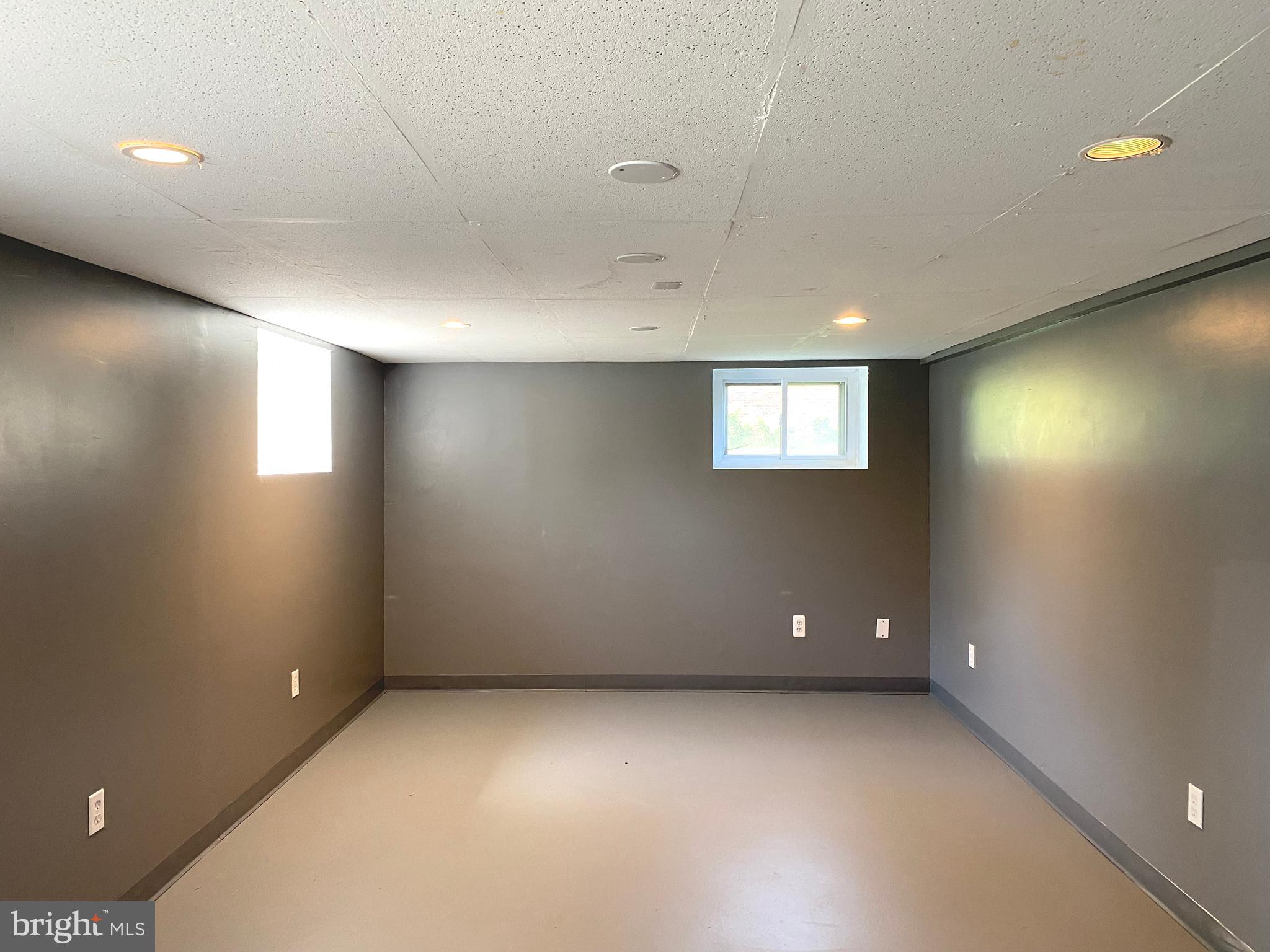 5072 Rock Springs Road Warrenton, VA 20187 - Photo 25 of 28 an empty room with windows and entrance