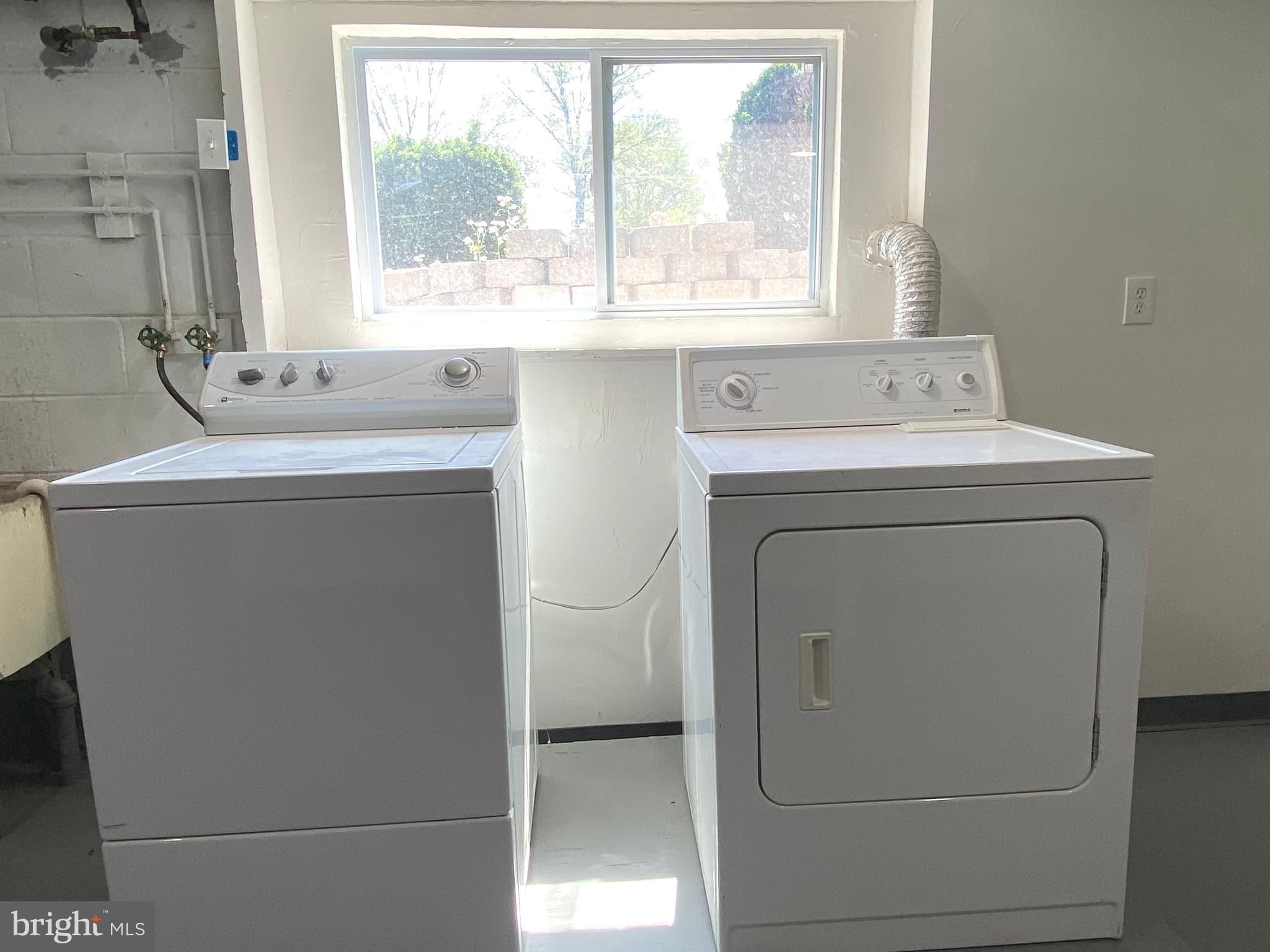 5072 Rock Springs Road Warrenton, VA 20187 - Photo 26 of 28 a utility room with dryer and washer