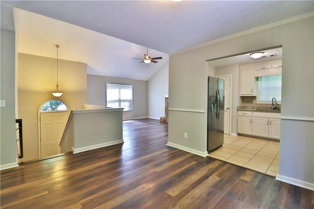 353 Fall View Court Winder, GA 30680 - Photo 20 of 61 a view of a kitchen cabinets and wooden floor