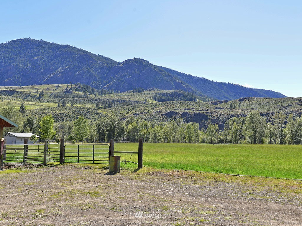 26 Beaver Pond Road Twisp, WA 98856 - Photo 25 of 31 a view of a garden with a large tree