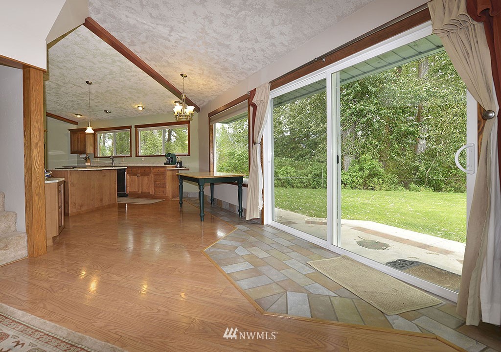 26 Beaver Pond Road Twisp, WA 98856 - Photo 10 of 31 a view of a dining room with furniture window and outside view