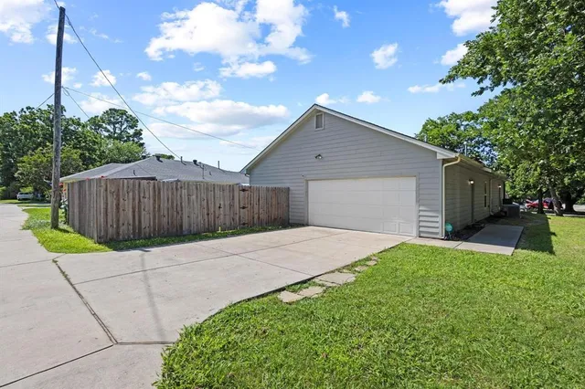 a backyard of a house with lots of green space
